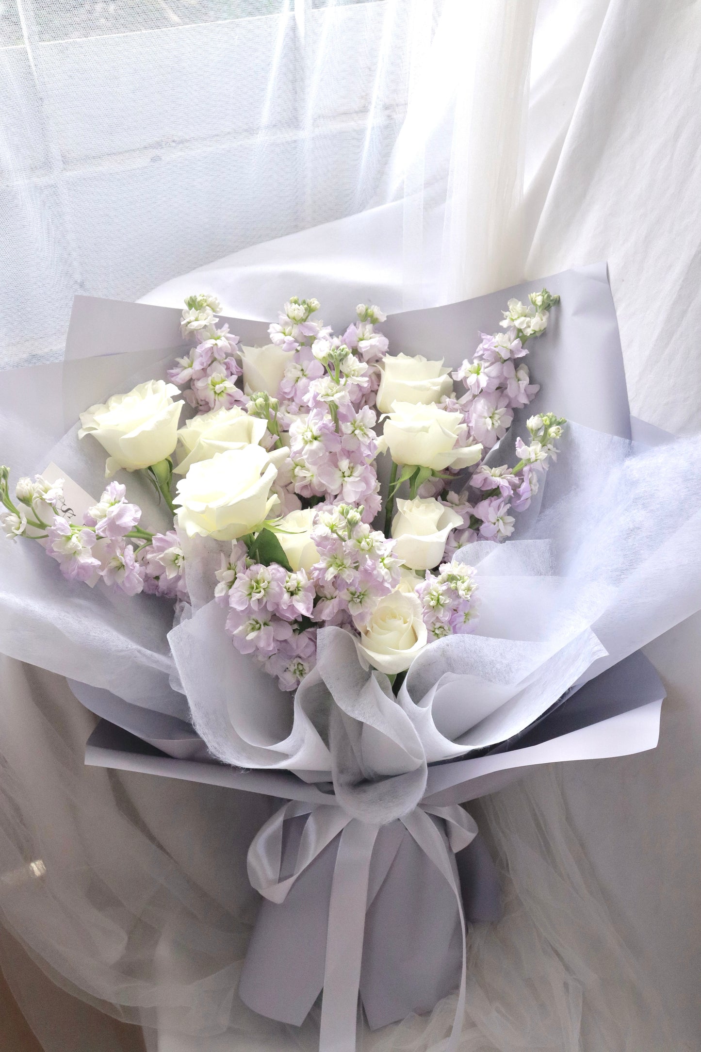 Rapunzel Purple Mathiola & White Rose Bouquet