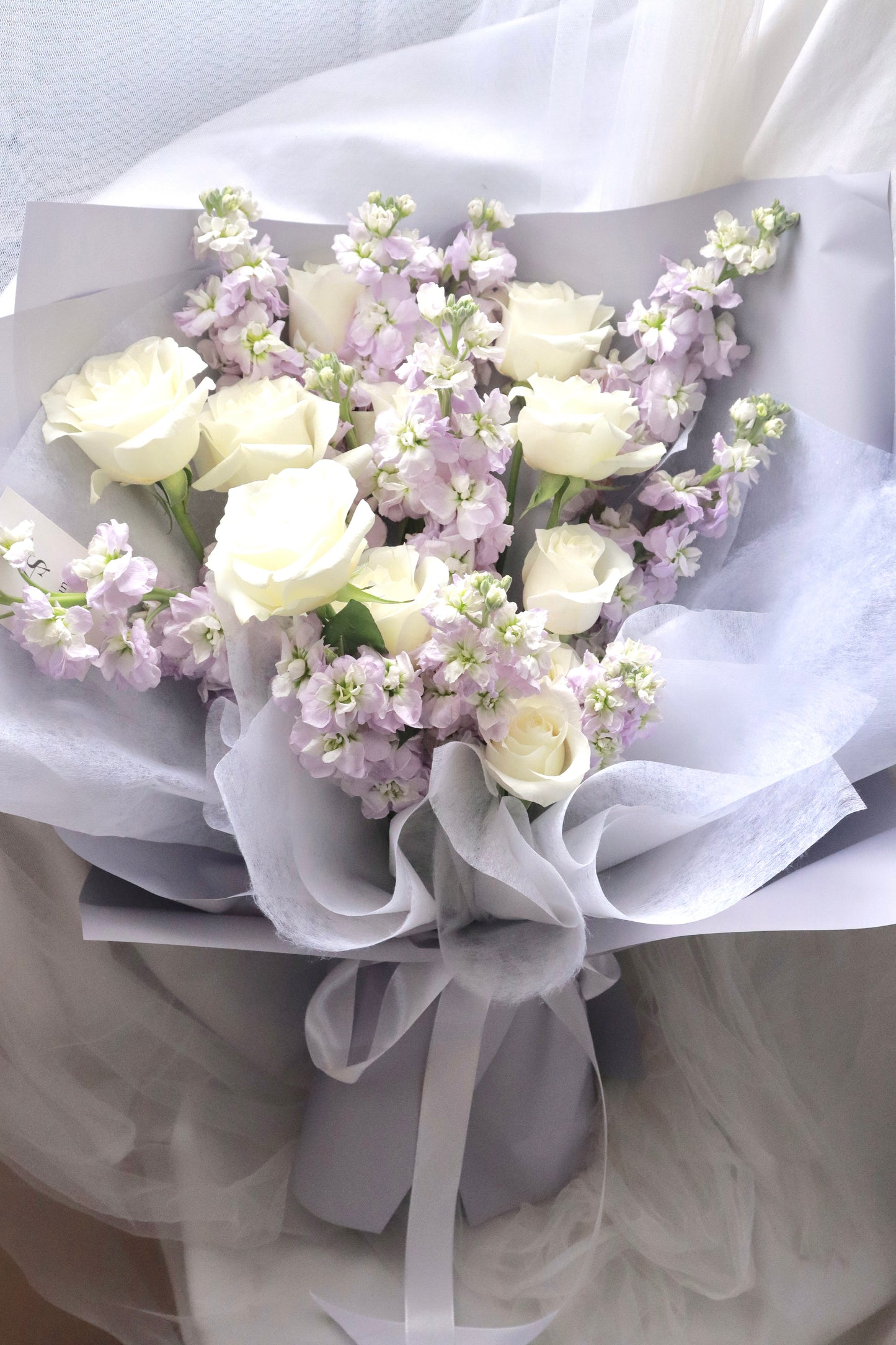 Rapunzel Purple Mathiola & White Rose Bouquet