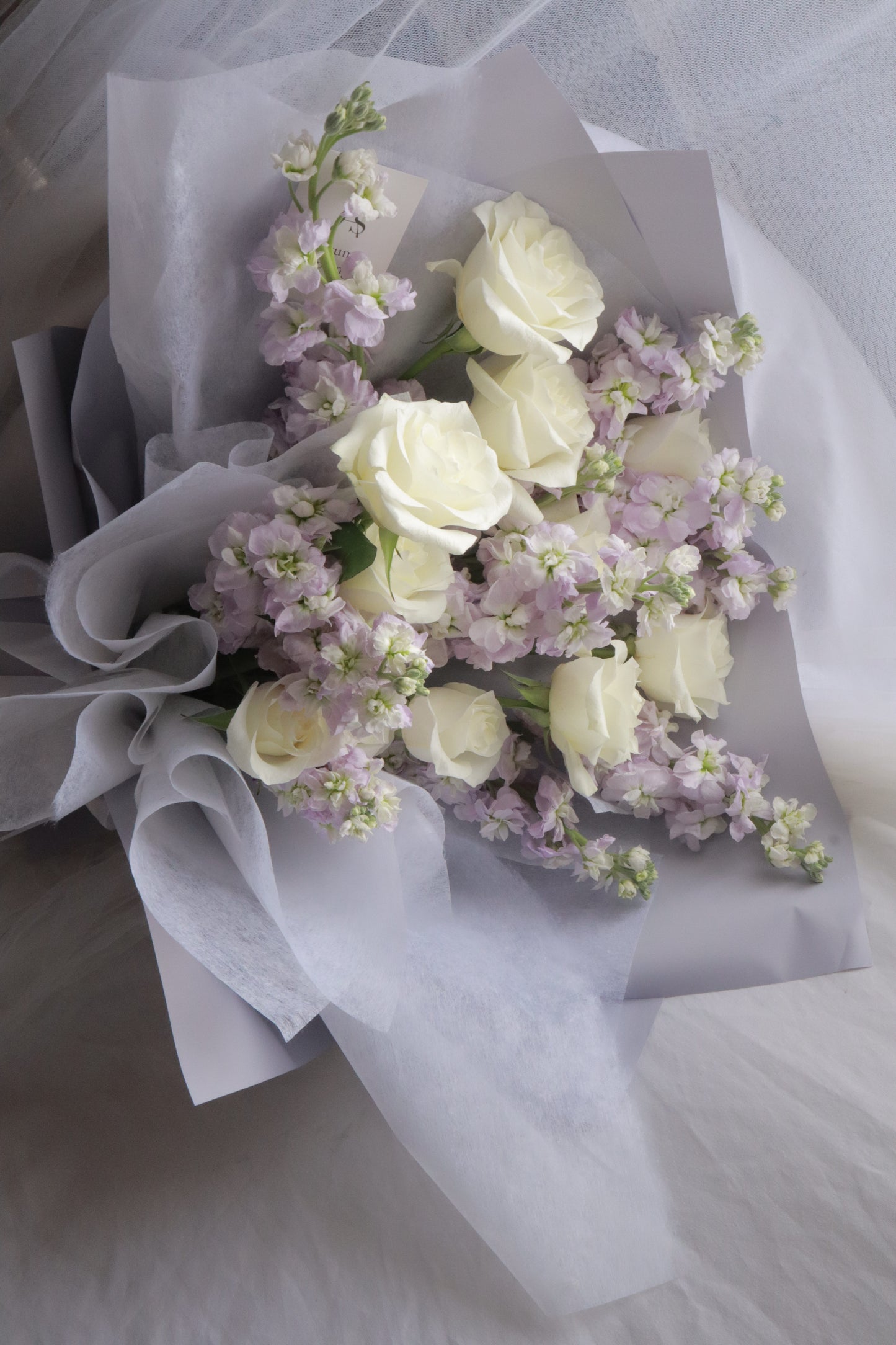 Rapunzel Purple Mathiola & White Rose Bouquet