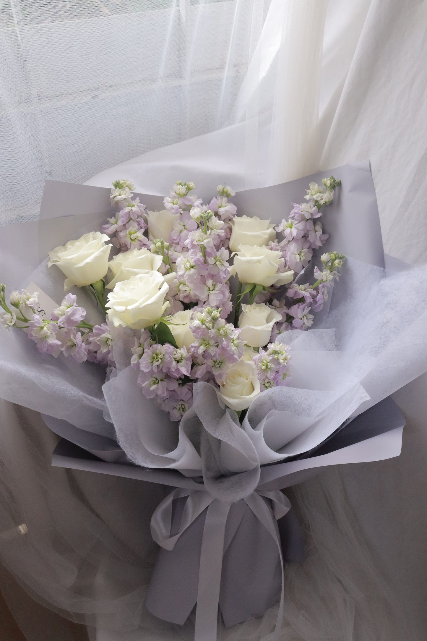 Rapunzel Purple Mathiola & White Rose Bouquet