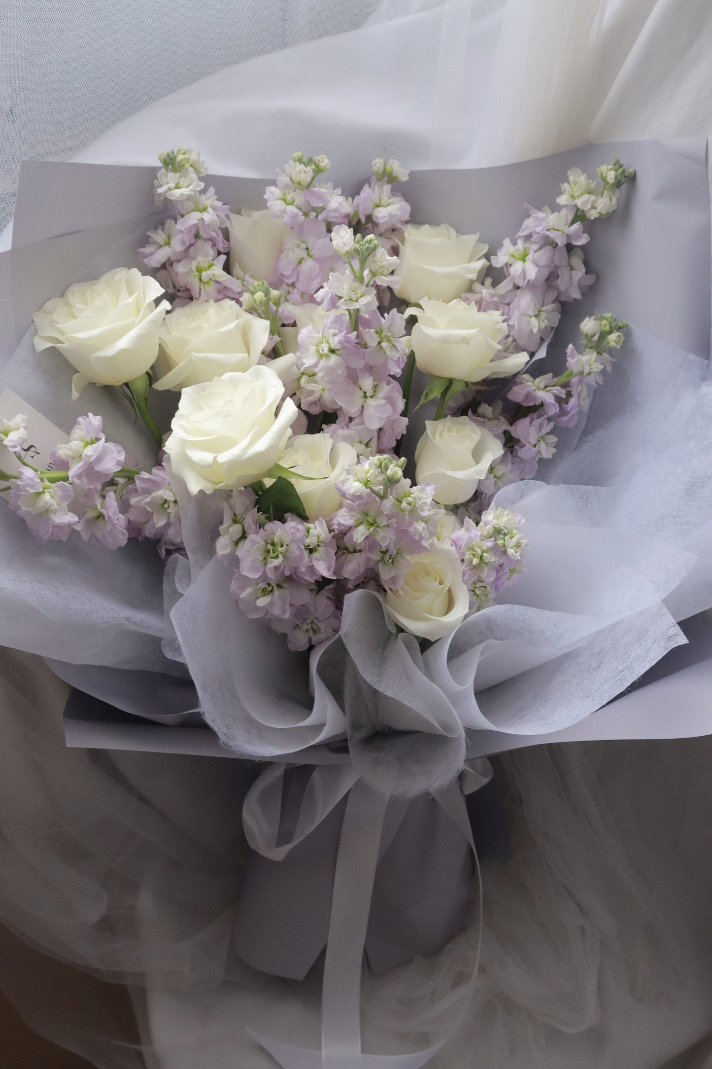 Rapunzel Purple Mathiola & White Rose Bouquet